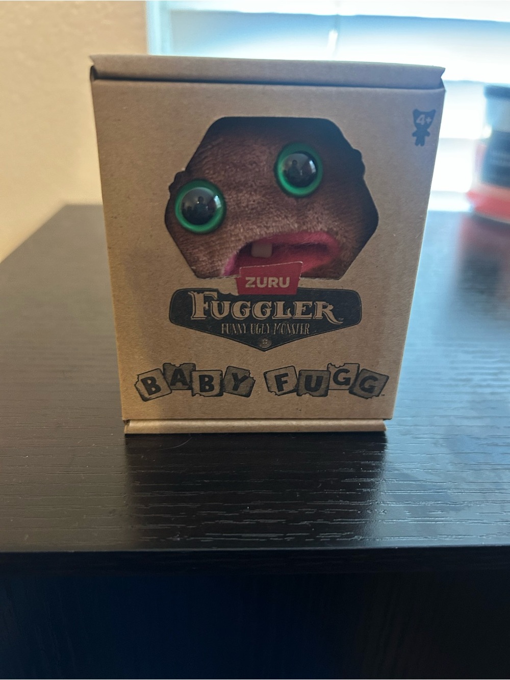ZURU Fuggler Baby Fugg Plush in Brown with Green Eyes